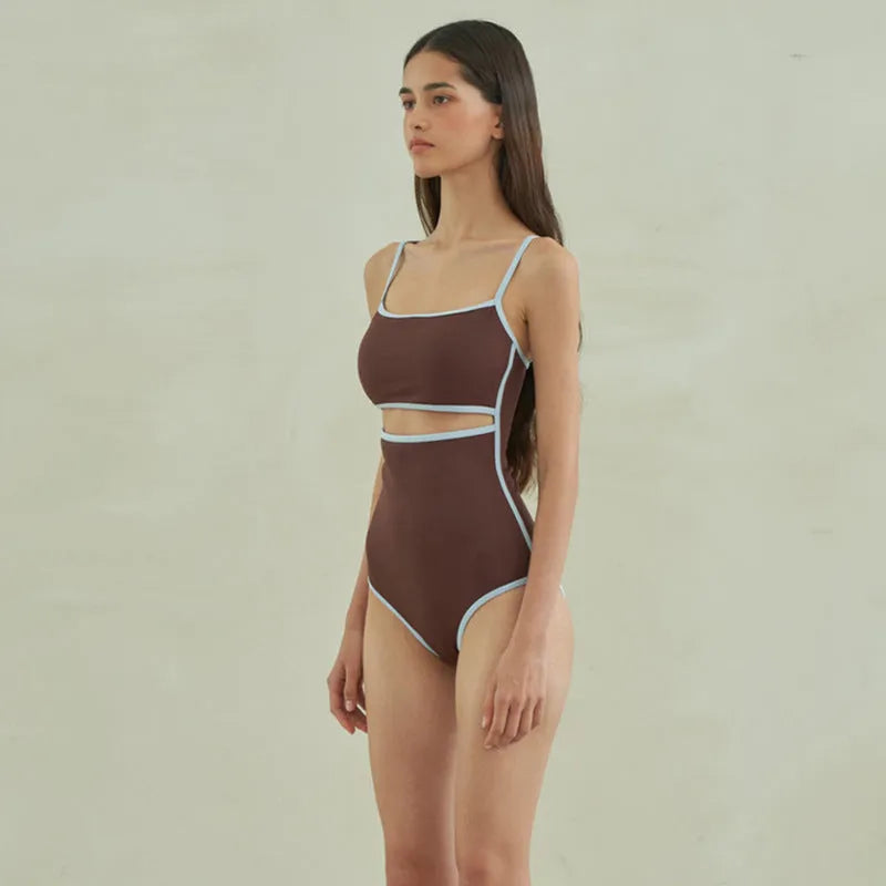 Brown women's one-piece swimsuit with triangle bikini top design and sexy pattern