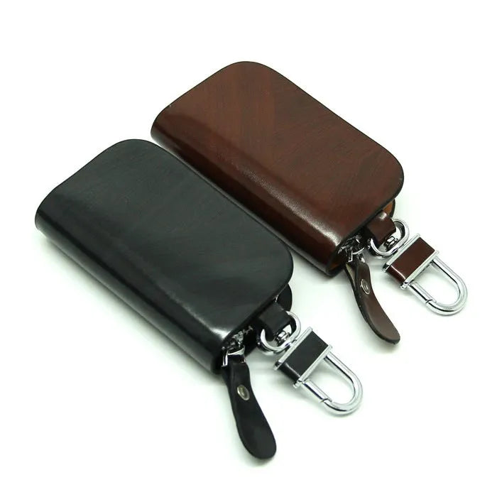 V-shaped genuine leather car key case with frosted finish showing black and brown colour options