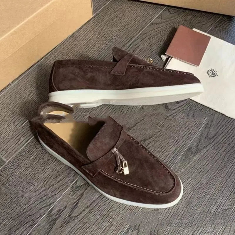 Slip-on loafers with rubber soles, steel toe caps, and artificial PU uppers in multiple colour options
