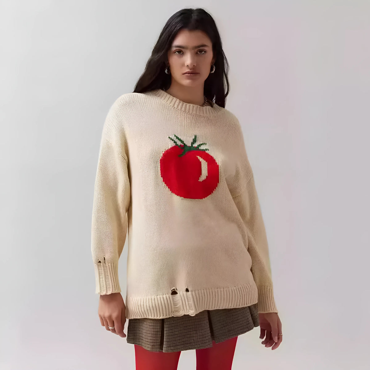 Beige milky white women's acrylic jacquard knit pullover sweater with round neck and long sleeves.