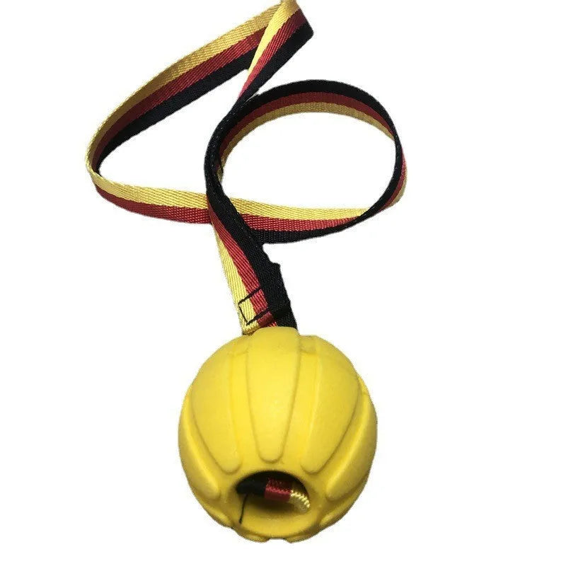 Yellow and camouflage coloured EVA floating dog chew balls in three different sizes on a blue background.