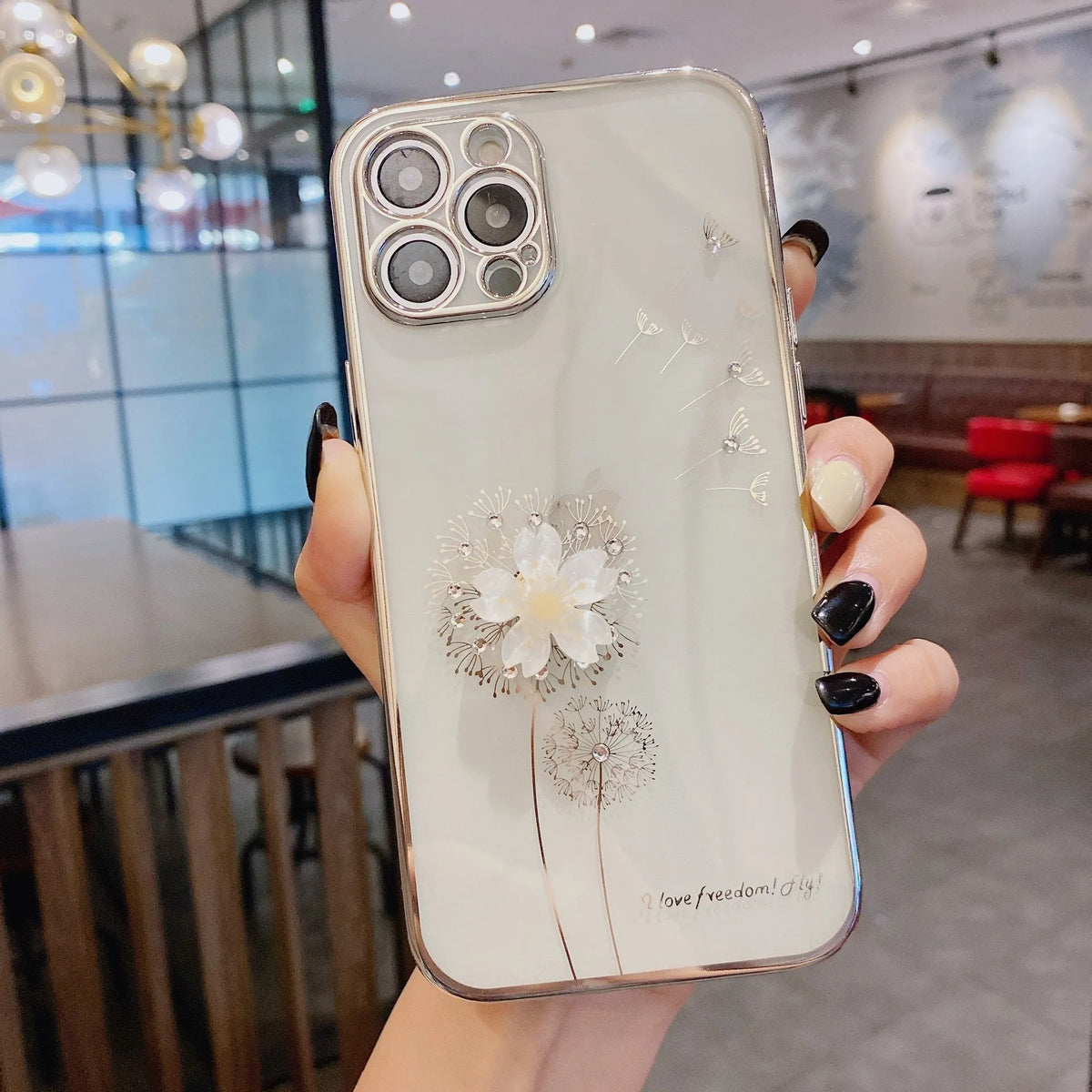 Green TPU iPhone case with a floral design and built-in screen protector shown on an iPhone.
