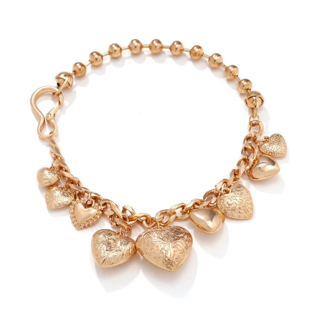 Carved heart pendant necklace on adjustable 41-50cm chain in gold alloy metal