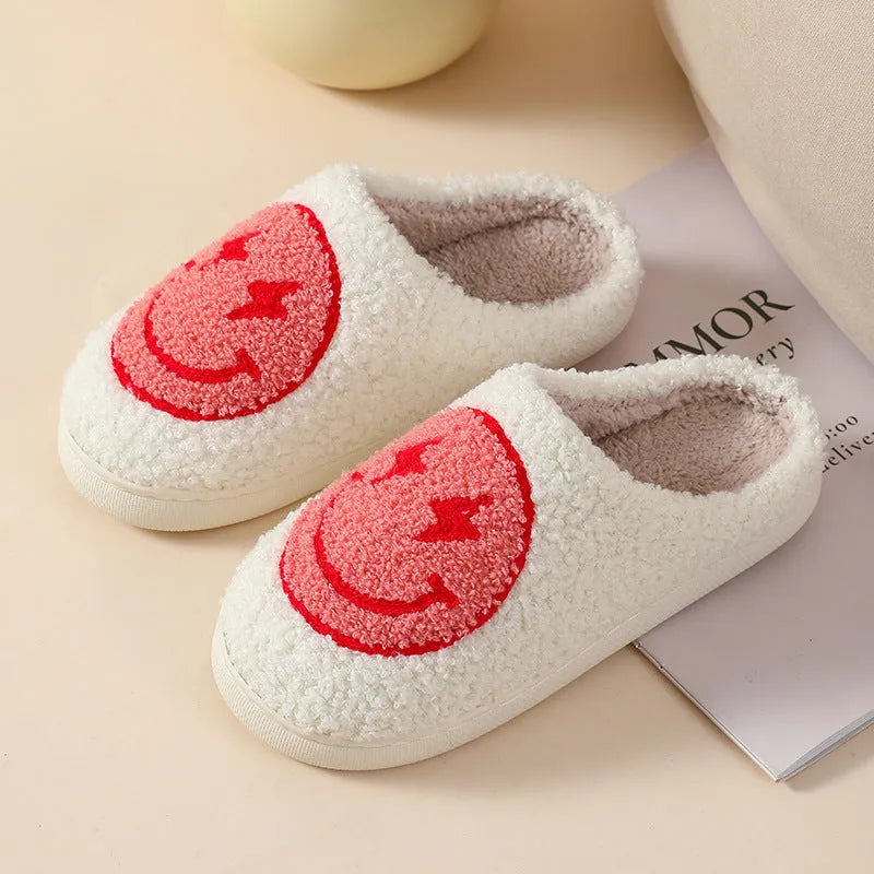 Women's plush cartoon love style home slippers with a round toe and PVC sole.