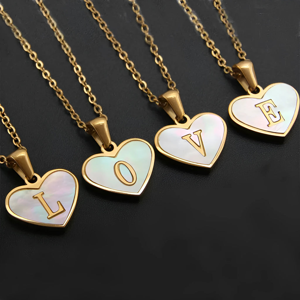 Gold-plated heart-shaped white shell necklace with adjustable chain and letter personalisation option