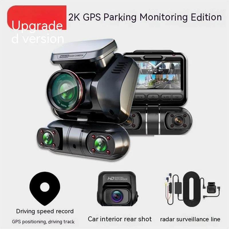 Plastic multi-lens car dash cam with a 2-inch screen on a car dashboard.