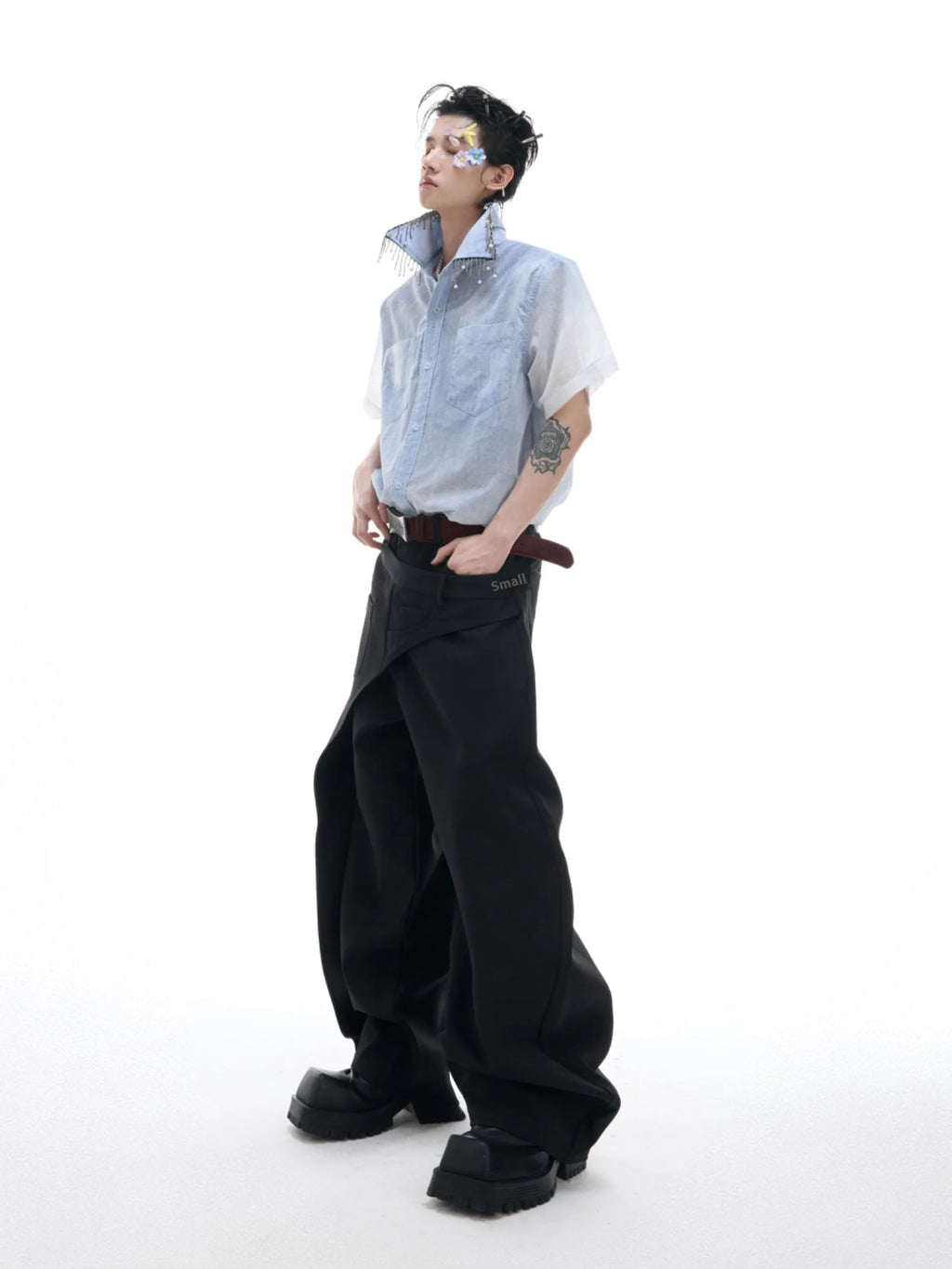A loose-fitting men's blue to white gradient short-sleeve shirt for casual summer wear.