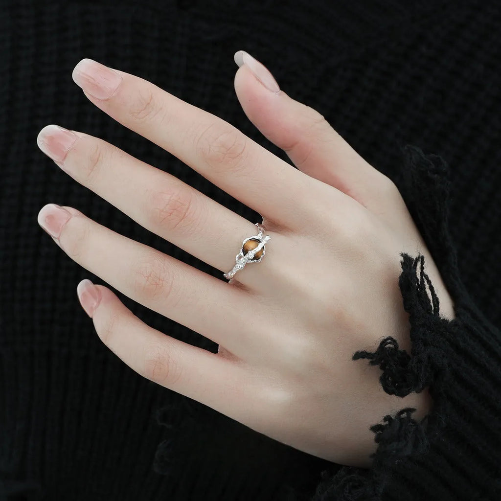 Women's adjustable Saturn open ring in white gold colour on silver.