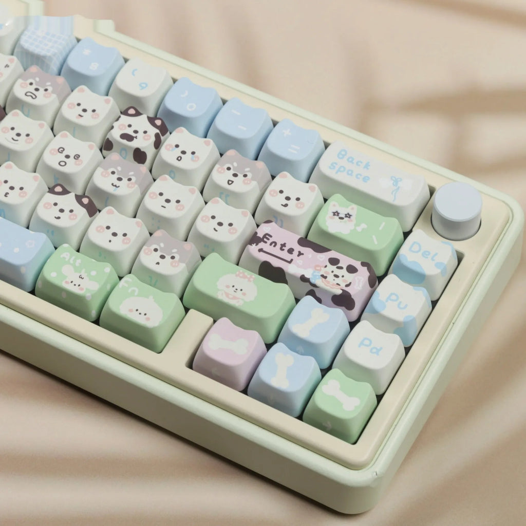 Full set of PBT keycaps with colourful sublimated cat and puppy designs for a mechanical keyboard.