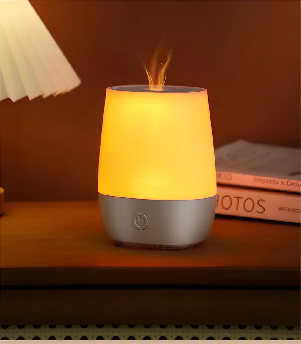 White USB aromatherapy humidifier with simulated flame effect, compact design with water tank