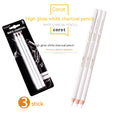 Three white charcoal pencils with wooden barrels for drawing on dark paper