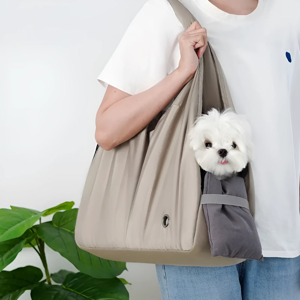 Apricot coloured cloth pet handbag carrier with shoulder strap for small dogs or cats.
