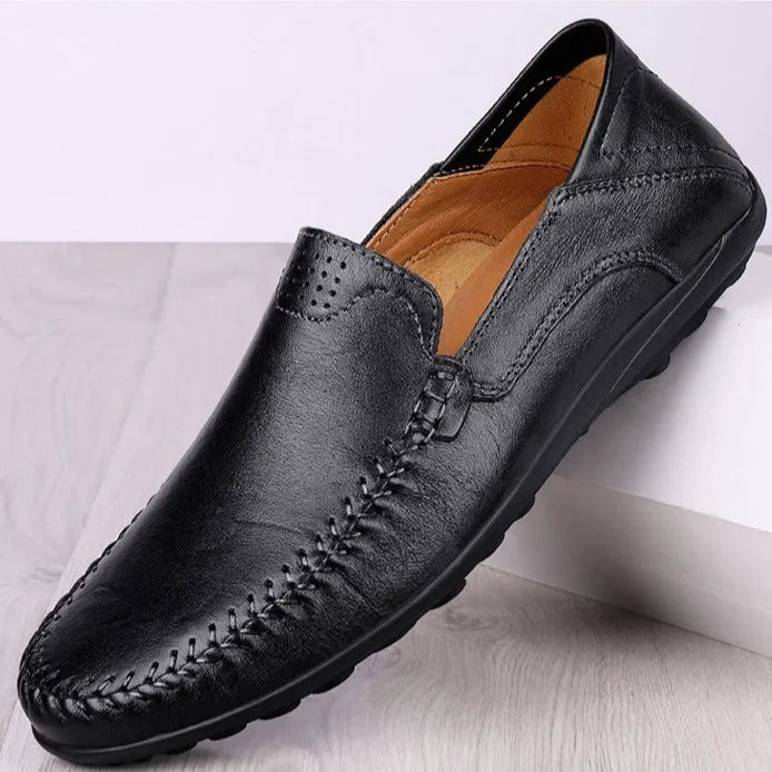 Men's brown leather casual shoes with round toe and flat heel, shown from side angle