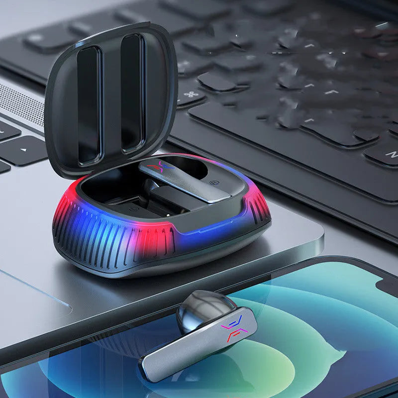 Hall Flashing black and white wireless in-ear gaming headsets with charging cable.