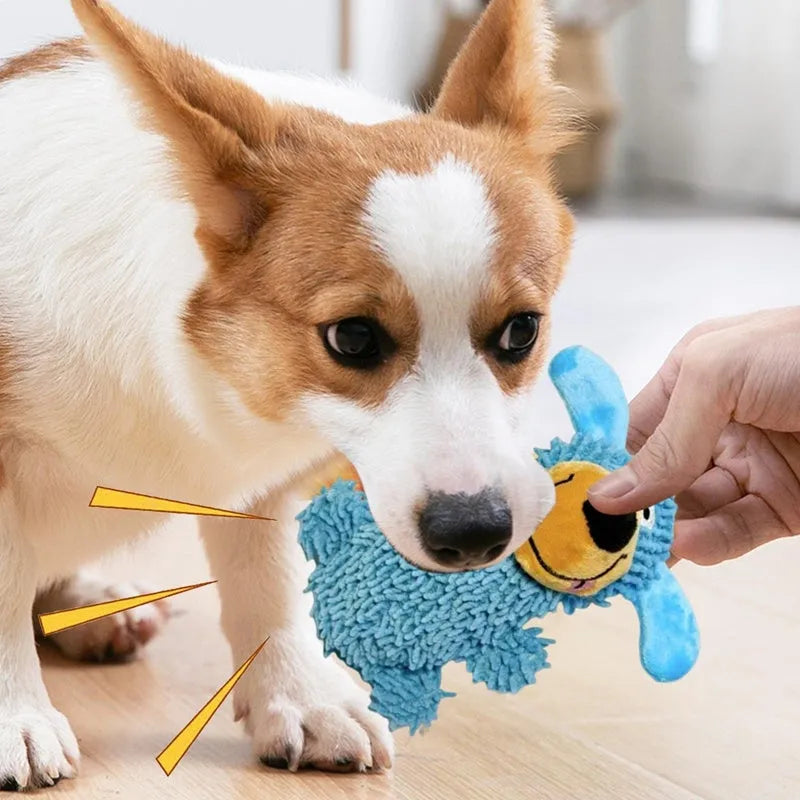 Blue plush dog-shaped squeaky toy for puppies and dogs, soft fabric with cheerful face