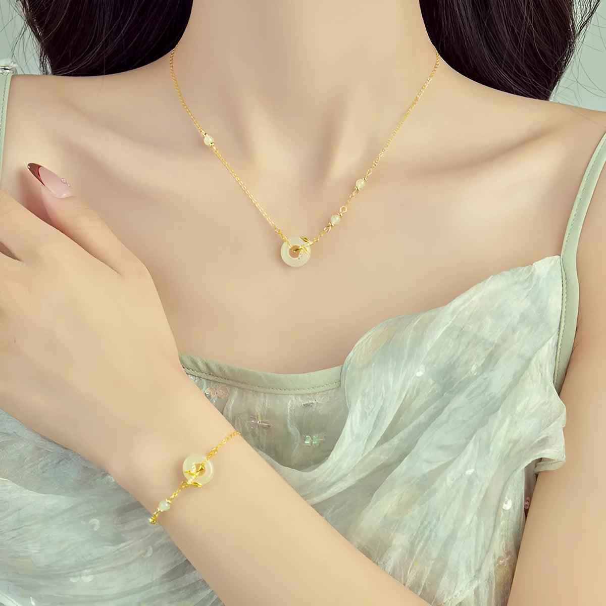 Women's antique-style 925 silver bracelet with Hetian jade and a gold-toned safety buckle clasp.