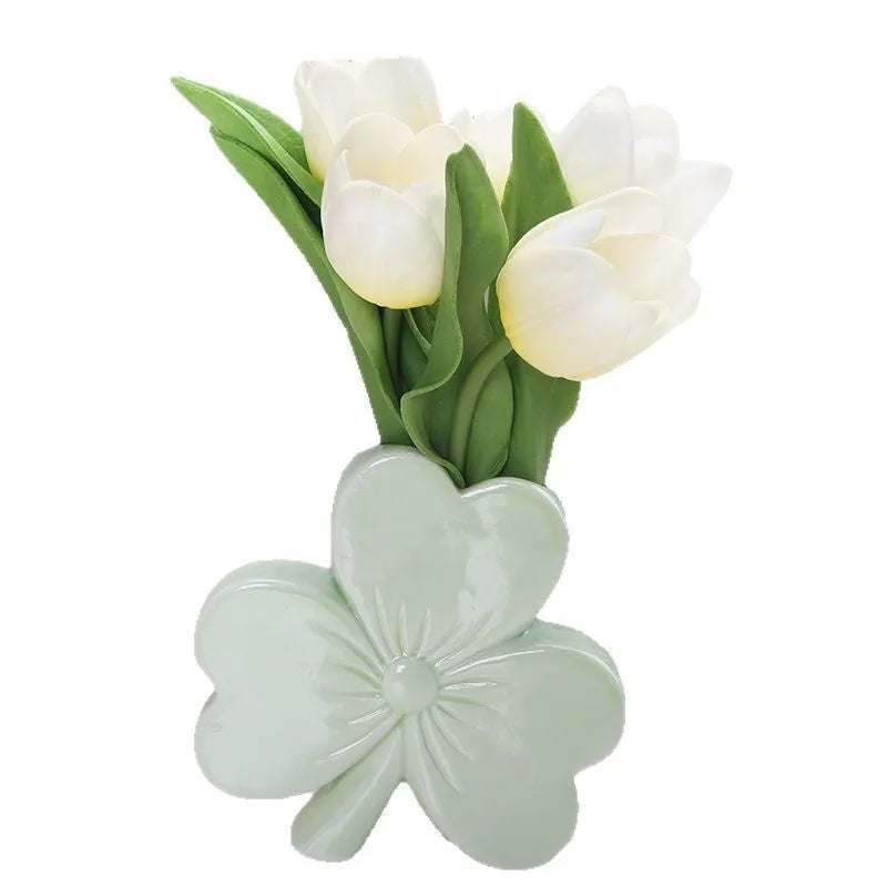 White porcelain clover-shaped ceramic vase in light green, pink, red, or white colours.