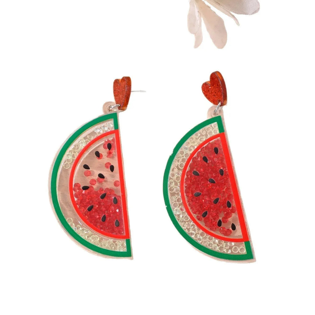 A pair of acrylic earrings shaped like a cherry, strawberry, watermelon, pineapple, coconut cake, or ice cream.