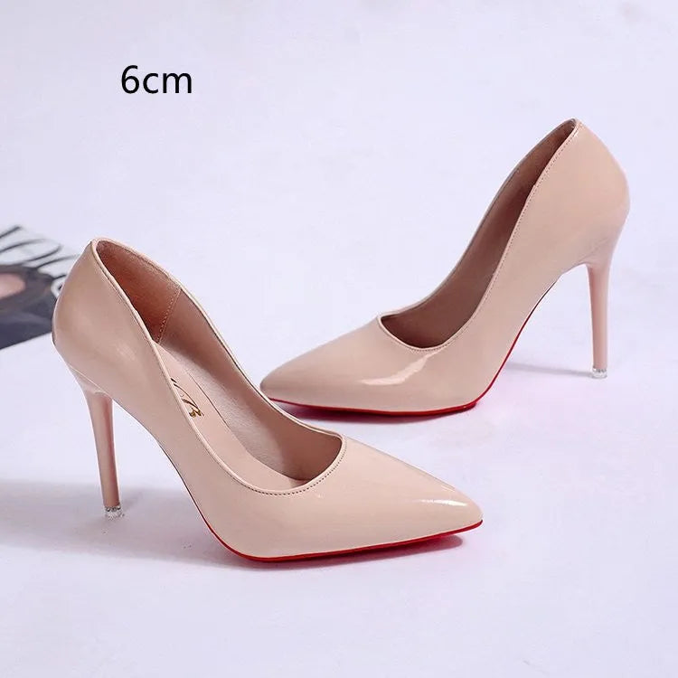 Women's solid colour stiletto heel pumps with a pointed toe and shallow mouth design on a white background.